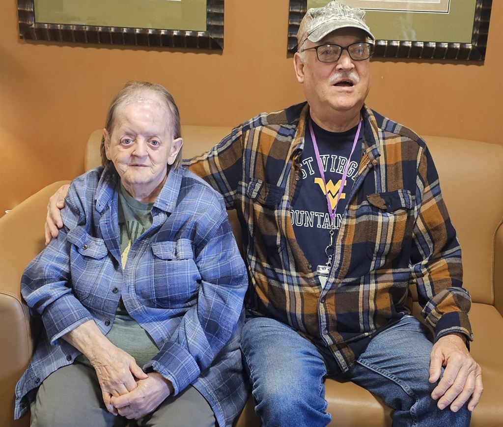 a-woman-and-man-sitting