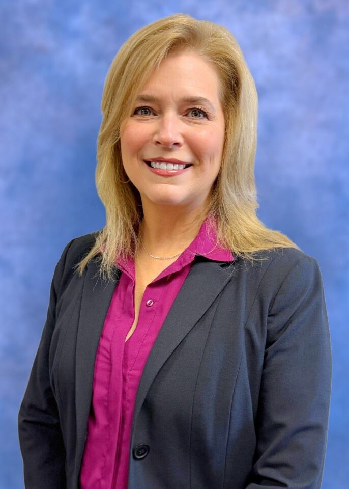 Carol Grove poses for a photo.