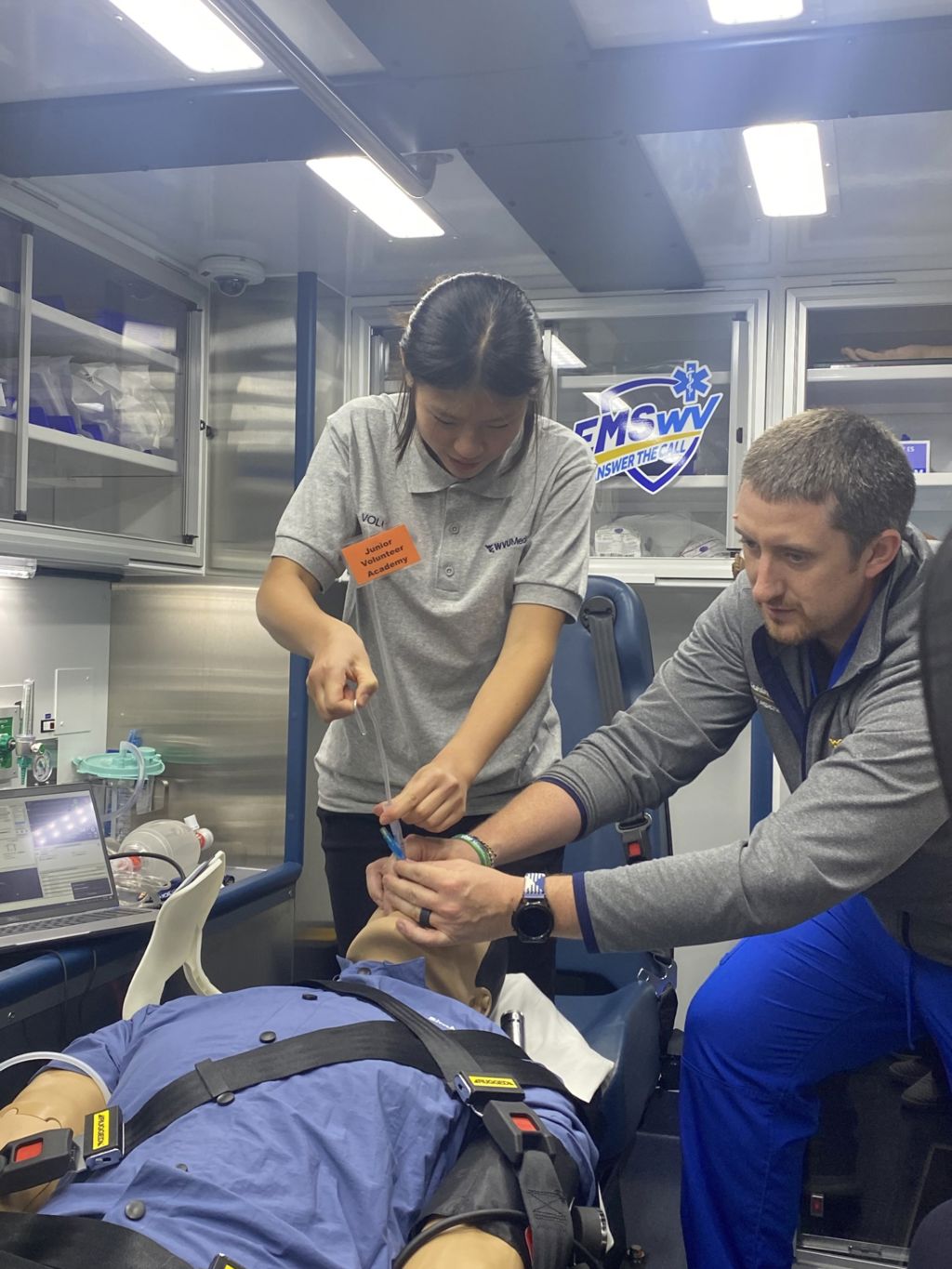 Katherine Wang, 2023 Junior Volunteer Academy participant, and Dale Quinlin, R.N., WVU Medicine J.W. Ruby Memorial Hospital Emergency Department