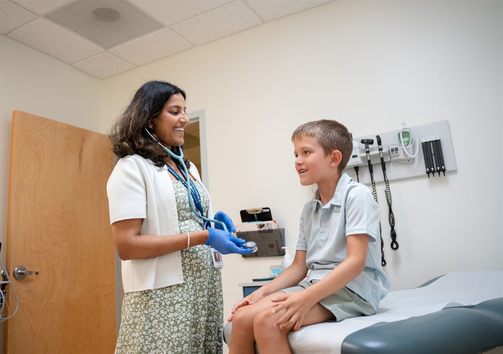 Angel Sunny, MD, sees a patient in Ranson.