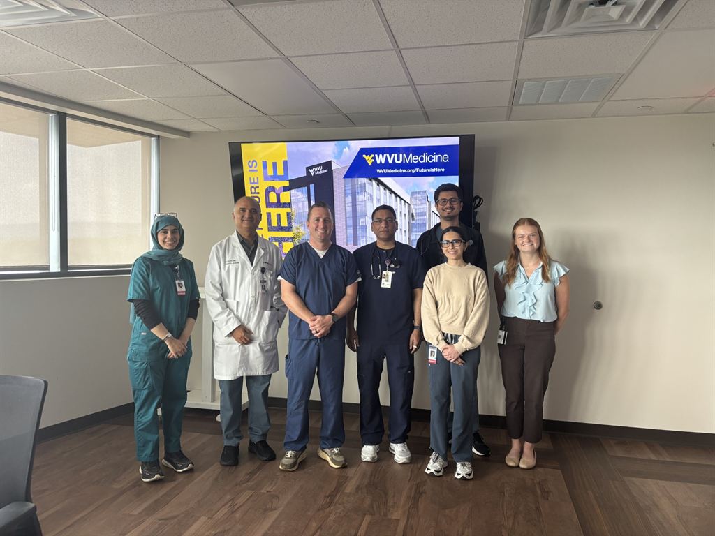 Mark O'Hern poses for a photo with Internal Medicine residents at WVU Medicine Berkeley Medical Center.
