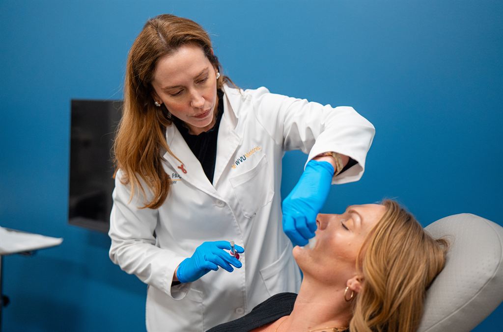 Sarah Cross, PA-C, injects dermal fillers.