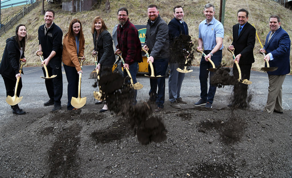 People holding shovels