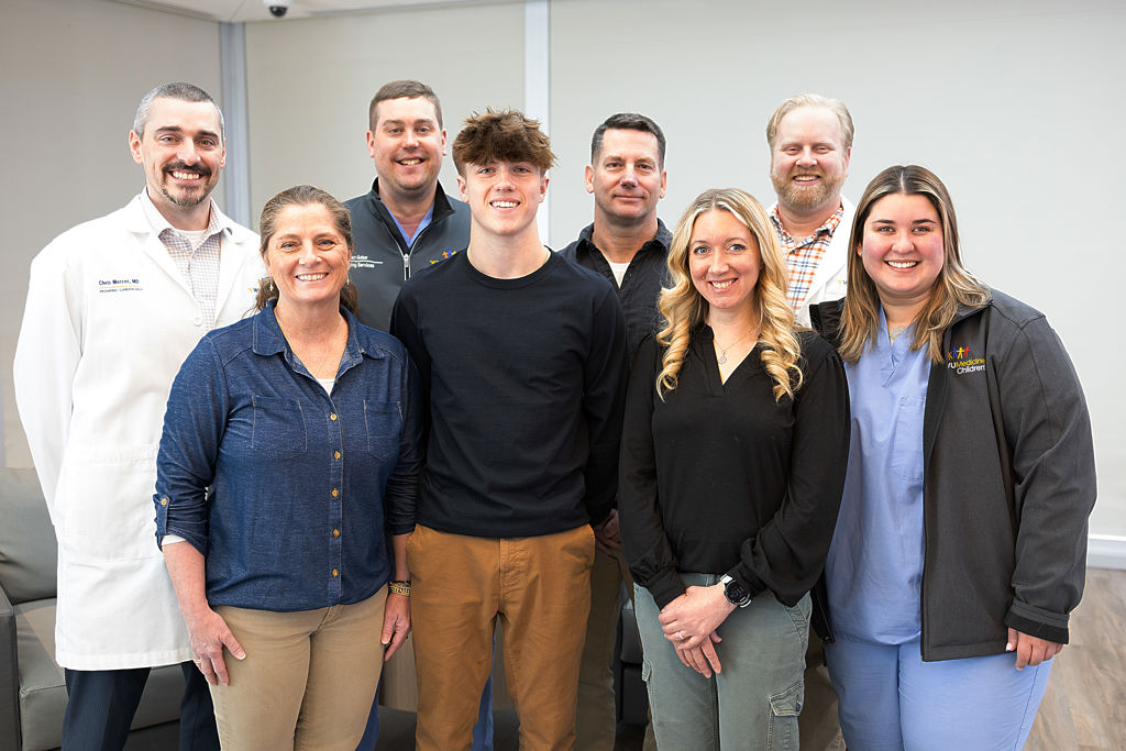 Front row left to right: Christopher Mercer, M.D.; Dan Gober, R.T.(R), pediatric interventional tech; Doug Haberlein; Alex Verhoeven, M.D.; bottom row: Lisa Haberlein; Zach Haberlein; Jenna Haberlein; Sophia Libonati, R.T.(R)(CI), pediatric interventional modality specialist