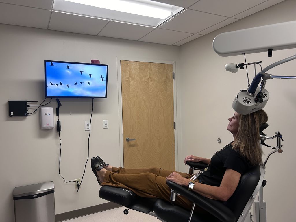 patient-reclined-while-wearing-headpiece
